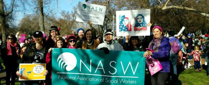 Large Group Of NASW Chapter Members At Outdoor Rally With NASW Banner